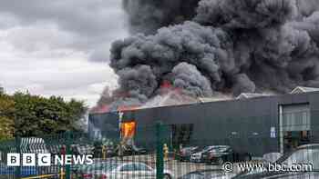 Fire engulfs car service centre on industrial estate