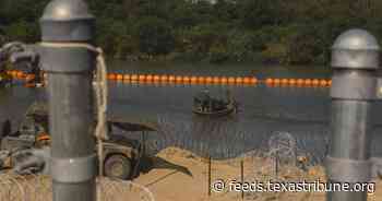 Texas’ floating barrier in the Rio Grande can stay for now, appeals court says