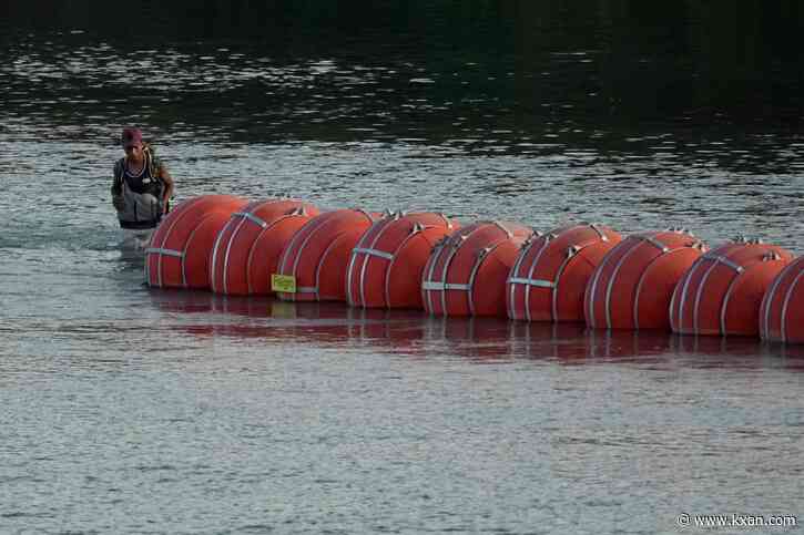 Texas’ floating barrier in the Rio Grande can stay for now, appeals court says
