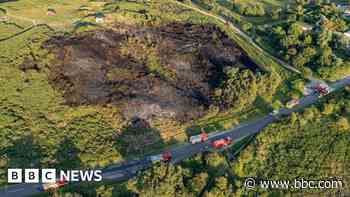 Crews tackle heath blaze as temperatures soar