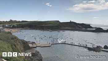 Surfers rescue three teens from rip current