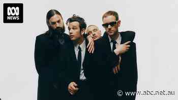 UK band The 1975 sued for $3.76 million over 'gay kiss' that got festival cancelled