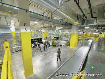 Amazon vans are ready to roll from new distribution station