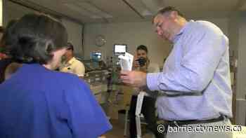 Welcoming RVH patients to Barn Burner hockey game