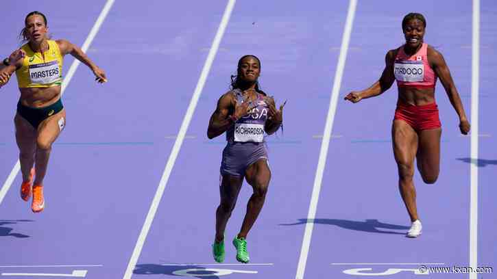 Sprinter Sha'Carri Richardson easily wins 100 meters in opening round at her first Olympics