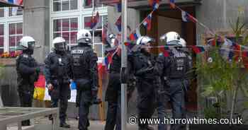 Tensions flare as riot police separate fight between England and Serbia fans