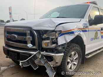 Saskatoon man charged after truck rams police vehicles
