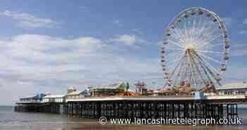 Woman in hospital after falling through section of pier in seaside town