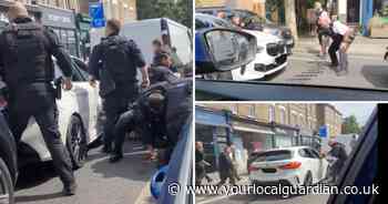 Shocking video shows armed police flocking to driver of car on Wandsworth Bridge