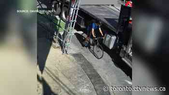 'Lucky he was not killed:' Video shows cyclist slamming into turning truck on Bloor Street