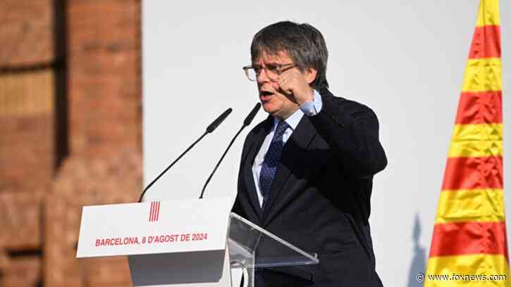 Catalan separatist Puigdemont evades capture on chaotic return to Spain