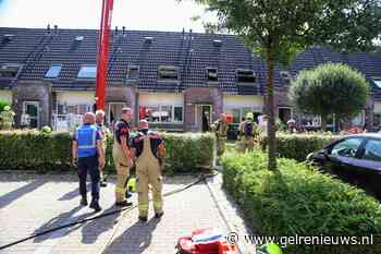 Brandweer redt vrouw uit een brandende woning