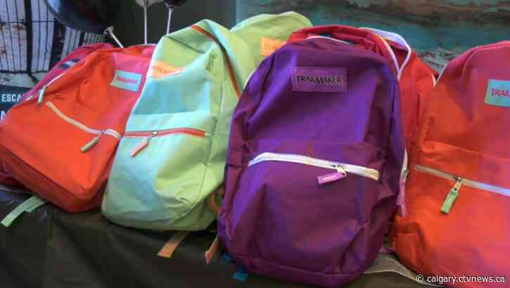 Owen Hart Foundation gives away thousands of backpacks to children in need