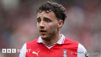 Wrexham sign Rotherham's Rathbone for 'club-record fee'
