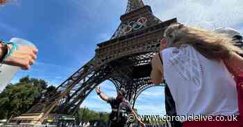 Eiffel Tower evacuated as man scales landmark hours before Olympic closing ceremony