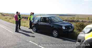 Cyclist in his 20s taken to hospital after crash with car on country road