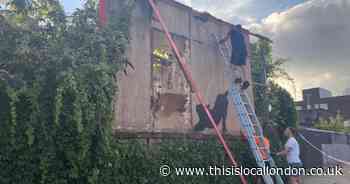 Crowds boo contractors as Cricklewood Banksy piece removed