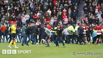 Doncaster charged with misconduct over pitch invasion
