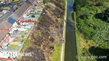 Canal embankment fire 'started deliberately'
