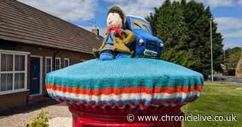 Mystery in Morpeth after knitted Vera and trusty Land Rover top neighbourhood post box