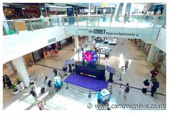 Material Focus calls on commuters to recycle with giant pink cat hologram