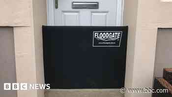 Homes by troubled dock given flood safety protection