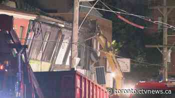 Crews tear down downtown Toronto building at risk of collapsing