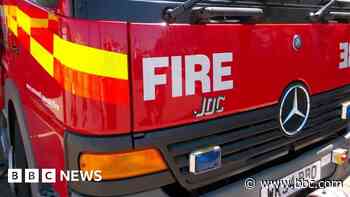Woman arrested over suspicious house fire