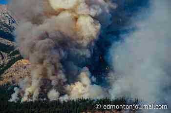 Jasper wildfire no longer 'out of control' as residents return to ravaged town