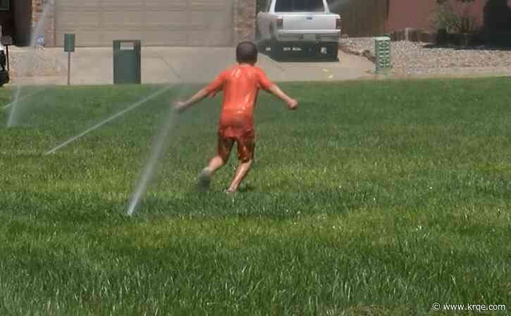 Families cooldown thanks to Albuquerque Parks and Recreation Department initiative
