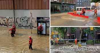 Water cascades down road by King's Cross station after burst pipe - in pictures
