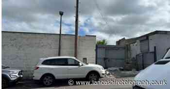 Tyre storage addition to garage in 'untidy' area approved