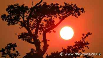 Who set the sky on fire? Britons are baffled as the skies over the UK turn RED - but there's a simple explanation