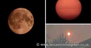 Blue supermoon glows red and orange in the skies above Blackburn