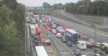 All traffic STOPPED with long delays near Dartford Crossing due to multiple incidents