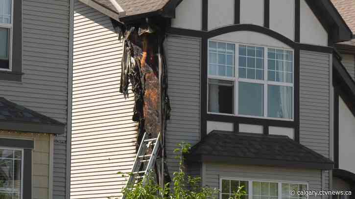 Homeowners use garden hose to stop spread of fire in S.E. Calgary