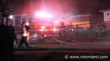 1 person dead, another detained after house fire in Miami