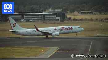 'We thought it was a scam': Batik Air cuts back Canberra-to-Bali flights, leaving travellers in the lurch