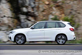 Missed connection: Bad plug leads to big BMW recall