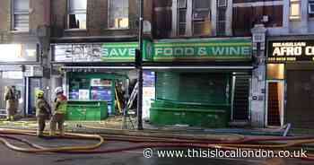 Shop destroyed and flats damaged in fire 'sparked by vape'