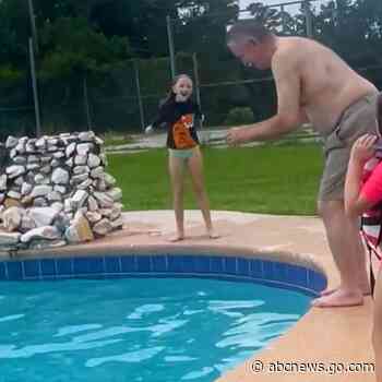 WATCH:  Kids teach their grandpa how to front flip in the pool
