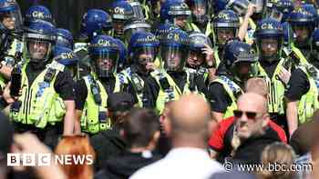 Man who threw bricks at police during riot jailed