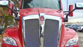 On the brink of a rail stoppage, some companies turn to trucking