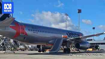 Jetstar passenger describes how man 'ripped off' plane's emergency exit door at Melbourne Airport