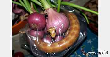 Vrouw gebeten door slang in groentetas