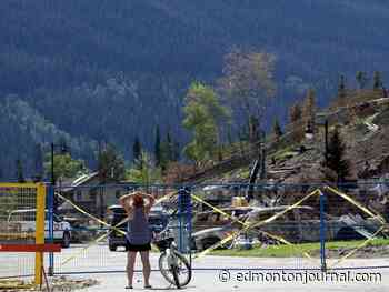 Fire held, highway reopened, but no timeline for return of visitors to Jasper