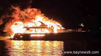 Rescue crews respond to fire aboard a yacht in Coachman Park waterfront