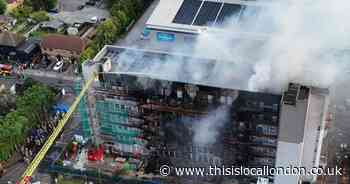 Dramatic photos show severe damage after huge fire in block of flats