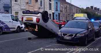 Pictures show extent of crash which closed main road through town