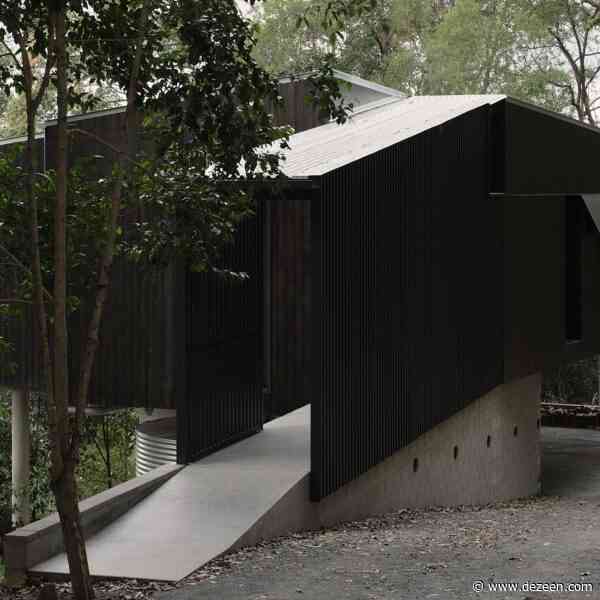 Fouché Architects perches black house on forested Queensland hillside